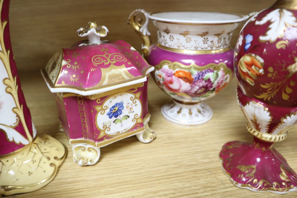 A group of English porcelain ruby ground vessels, c. 1825-45,